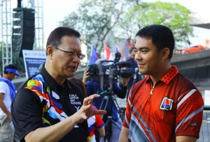 ​DSWD Asec. Jose Antonio Hernandez converses with the Malaysian Ambassador, H.E. Raszlan Abdul Rashid, before the start of the culminating program at the CCP Activity Area.