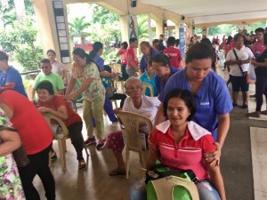 Solo parents avail of free massage services from therapists sent by TESDA.