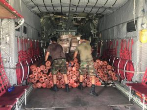 Relief assistance from the DSWD is being loaded to the C130 airplane of the Philippine Air Force.